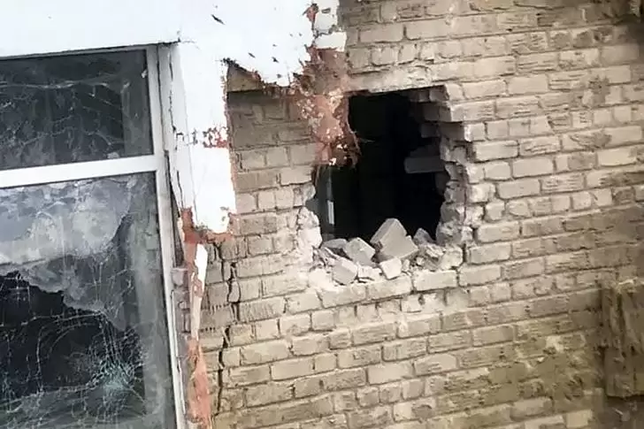 Hole in the kindergarten wall in Stanytsia Luhanska
