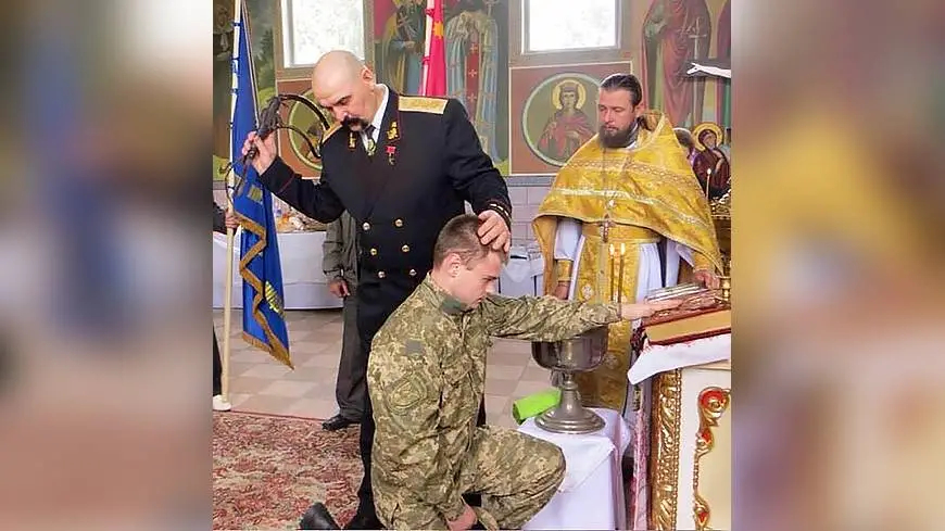 Cossack with a whip in the church