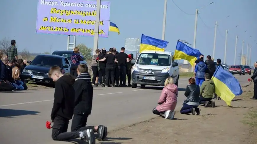 Ukrainians on their knees